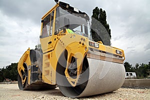 Large road-roller paving a road