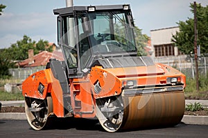 Large road-roller paving a road