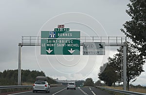 Large road sign to reach the resort of Mont Saint Michel France photo