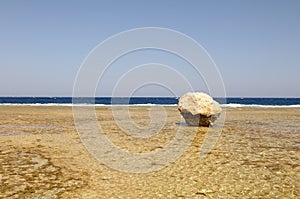 Large rock on beach