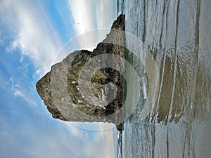 Large rock formation in sea