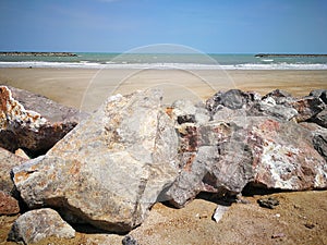 The large rock pile on the beach