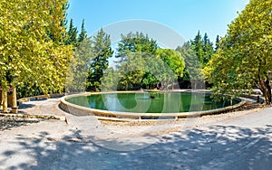 Large round cistern in Italian village of Eleousa Rhodes, Greece