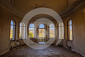 Large round hall with balcony old abandoned mansion