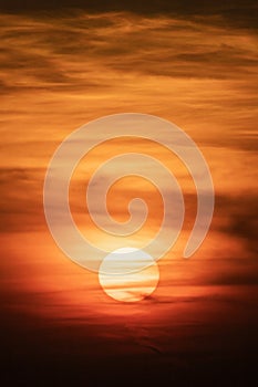 Large round orange sunrise or sunset