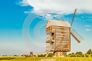 Large Russian wooden mill. Summer rural scene.