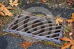 Large Rusty Metal Storm Drain Cover