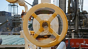 Large Rusty Yellow Heavy Industry Valve Wheel