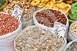 Large sacks of spices and seeds, dried fruits in Market - Mahane Yehuda in Jerusalem, Israel