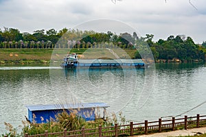 A large sand mining ship in the river