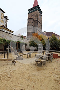 Large sand playpit by the historic tower