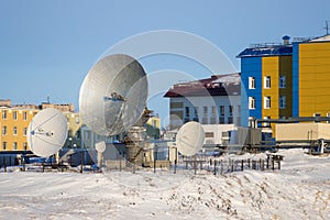 Large satellite dishes in a northern city in the Arctic