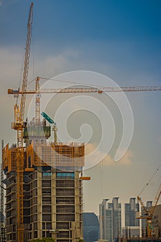 Large scale condominium construction site with the luffing jib t