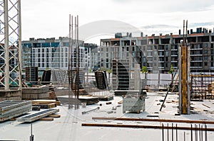 Large scale construction site featuring the foundation of what will be a large skyscraper