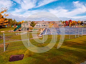 Large schoolyard awaiting its students.