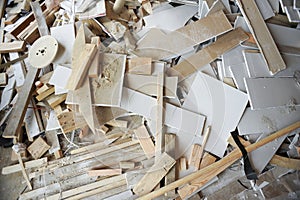 Large scrap pile of wood and drywall cutoffs