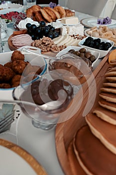 Breakfast table with food served