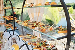 A large selection of food and different snacks in the oncoming zone of guests. A buffet for guests