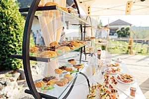 A large selection of food and different snacks in the oncoming zone of guests. A buffet for guests