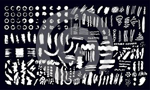A large set of abstract elements for design. Hand drawn black and white vector illustration. Spots, blots, lines