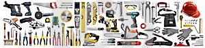 Large set of construction tools on a white background