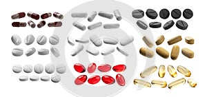 Large set of tablets and capsules isolated on a white background