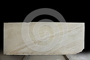 Large slab of Travertino Alabastrino Marble in beige with a pattern photo
