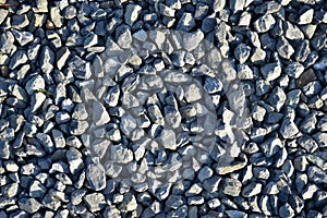 Large and small blue pebbles stone texture