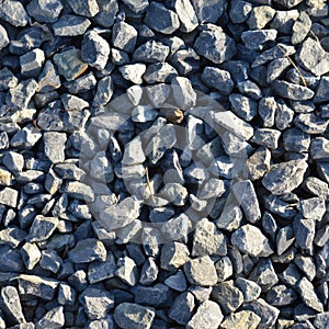 Large and small blue pebbles stone texture