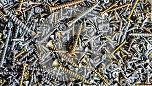 Large and small screws background, rotation