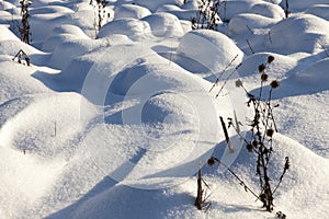 large snowdrifts after snowfalls and blizzards, the winter