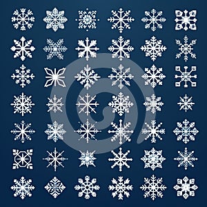 Large Snowflake Vector Icon Set On Dark Blue Background photo