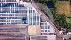 A large solar cell roof on an industrial building Generating electricity for the plant