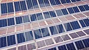 A large solar cell roof on an industrial building Generating electricity for the plant