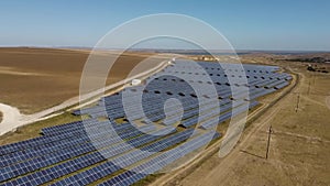 Large solar panel field creating energy. Aerial view