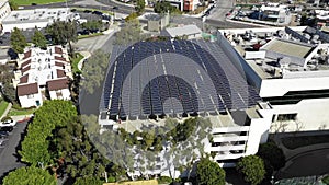 Large solar panels, parking structure, aerial renewable green energy, Long Beach