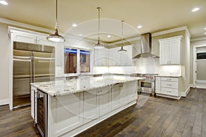 Large, spacious kitchen design with white kitchen cabinets