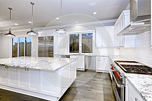 Large, spacious kitchen design with white kitchen cabinets