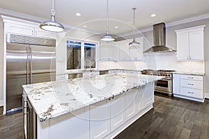 Large, spacious kitchen design with white kitchen cabinets