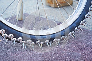 Large spikes on the wheels of bike for Speedway