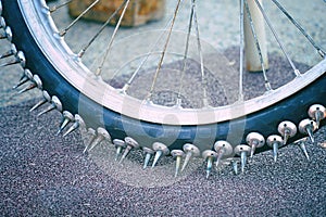 Large spikes on the wheels of bike for Speedway