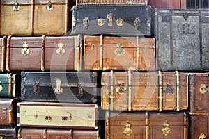 Large stack of antique suitcases