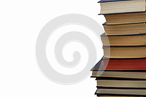 A large stack of books on a white background, a lot of literature. Broad Outlook and knowledge, school curriculum, isolate.