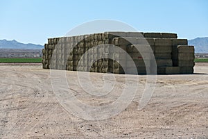 Large stack of hay bales