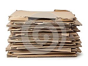 A large stack of recycled cardboard sheets