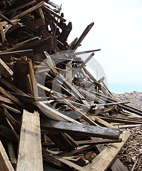 Large stack of wood on a demolition site