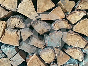 Large stack of wooden logs.