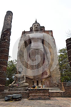 Large standing Buddha image Phra Attharot at Wat Saphan Hin, facing east, Sukhothai Historical Park, Thailand