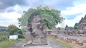 The large statue of Dwarapala complete with jewelry is symbolized as the guardian of temples in Indonesia photo