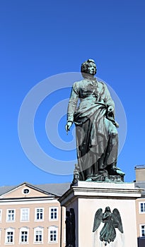large statue of the great composer Mozart in the square photo